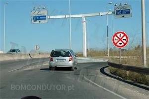 Questão IMT: Tendo em conta a sinalização vertical, que veículos podem circular nesta via?